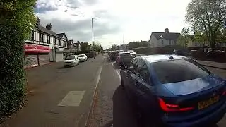 Phone driver encroaching cycle lane PJ70SGZ