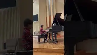 Ali plays an easy piano solo  version of 