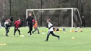 Landon training with Alan Smith of Manchester United