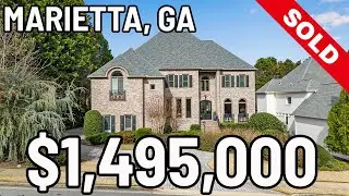 Fabulously elegant 4 sided brick estate home in sought after premier community in East Cobb's