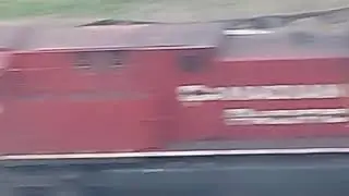 CP 8733, CP 8009 and CP 9756 taking a train
