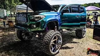 Lifted Toyota Tacoma on 28x16 TIS Forged Wheels.