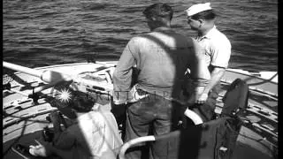 Trainees firing 40mm gun and on 3