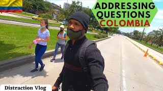 Eating pizza on Ciclovia in Bogot&aacute; Colombia & Addressing questions | Vlog
