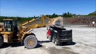 CAT 988 loading a dump truck