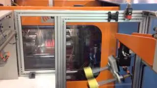 IML at ArabPlast Dubai CMM IML Chargemaster Micro Simco-Ion end of arm tool