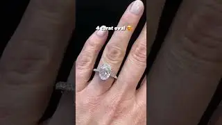4 carat oval with pave shoulders engagement ring made in hatton garden
