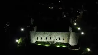 DRONE FLIGHT TO HARLECH CASTLE  AT NIGHT