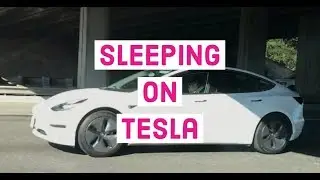 Man sleeping behind the wheel of his autopilot Tesla