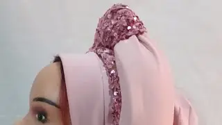Watch how I created this center knot turban cap