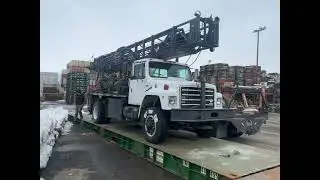 Failing F5 drill rig converted to air rotary with casing hammer