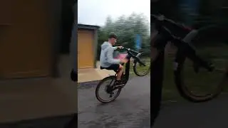 one handed wheelie