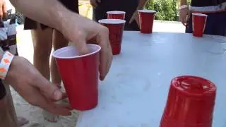 Flip Cup drinking game- part of Duplays Beach Sports