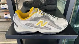 New Balance 204L (Raincloud/ Baroque Gold) - Style Code: U204LNPB