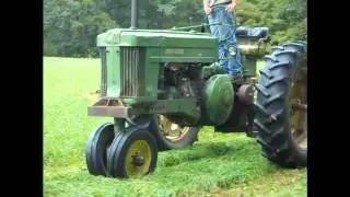 mowing hay with old hay bine