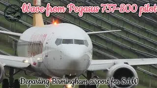 Pilot wave from Pegasus Boeing 737-800 as they depart Birmingham airport for SAW