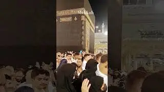 Boy giving salute while doing umrah on his father shoulder.#umrah #salute #Alhamdulillah #father