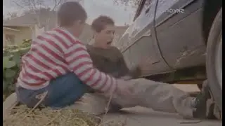 Craig runs over Reese's leg after the boys crash the mini bike.