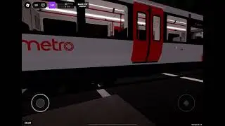 Class 398 tram-train departing Denton road
