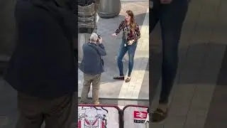 Rebecca Wood BBC Reporter Practices her Intro While Unveiled Ozzy The Bull Stands Above Watching on