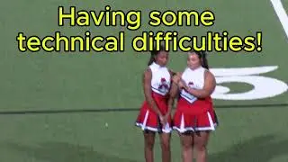 Archer Cheerleaders sing during military appreciation night.
