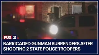 Barricaded gunman surrenders after shooting 2 state police troopers
