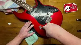 How to remove stubborn old stickers from a guitar.