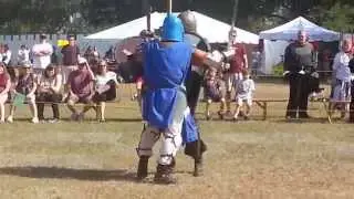 knights sword and axe fighting duel