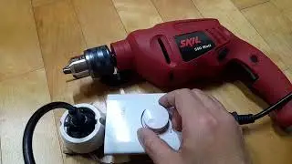 Speed control of an electronic drill using a dimmer switch