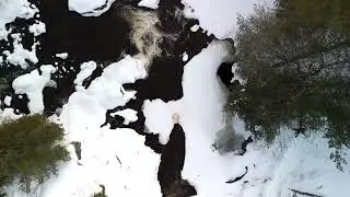 Winter River Rapids: Aerial Drone Footage of Snowy Wilderness