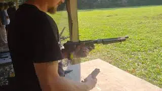 Shooting a world war II Thompson submachine gun.. lower range at knob Creek machine gun shoot