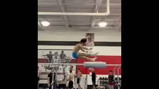 Bhavsar on parallel bars...  Ohio State University Camp 8/2022