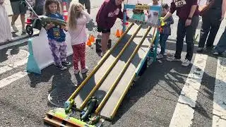 2025 zucchini racing at West Seattle Farmers' Market