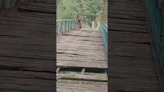 Crossing Barhian Suspension Bridge Huge gaps between wooden planks over Jhelum River