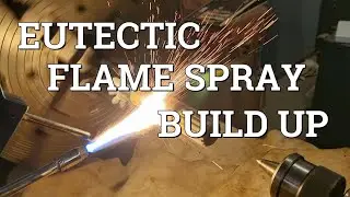 Flame Spray Repair On A Hydraulic Pump Shaft .