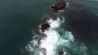 Canyon fly thru to San Mateo rocks during extreme low, negative tide.
