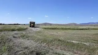 Big A with homemade round bale hay Trailer