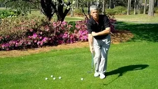 Golf side saddle chipping and putting technique.