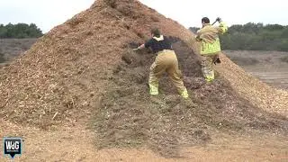 Broeibrand in stapel houtsnippers en naalden Geuzendijk