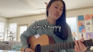 almost happy Elijah Woods Cover
