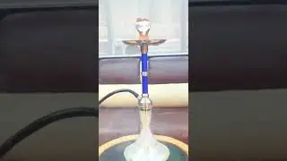 white transparent shisha with Royal blue stem .