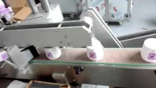 Conical cup both sides stick labeling machine