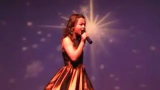 Kay-Lanie Lemmon sings its all coming back to me now.