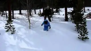 Alex skiing down steep hill