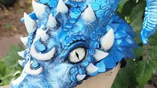 Painting a Dragon Hat Mask Sculpture