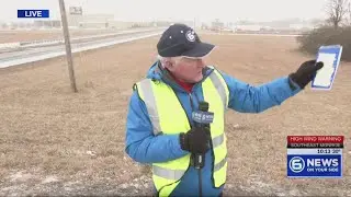 Don Dare reports on weather conditions as snow falls in Crossville