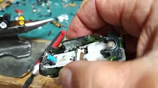 Slot cars and J-B weld gluing in screw post magnetic